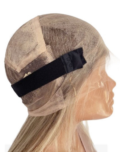 A photo of a full lace cap on a mannequin's head.