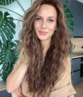 Wavy human hair wig in color "JENNIFER LOPEZ" (long)