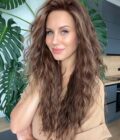 Wavy human hair wig in color "JENNIFER LOPEZ" (long)